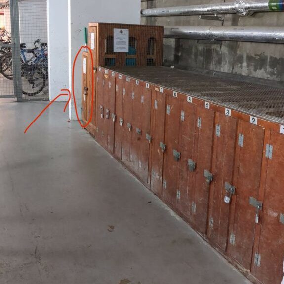 The wooden lockers on the right of the corridor
